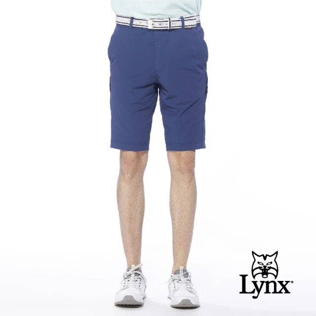 【Lynx Golf】男款吸排透氣LOGO字樣鬆緊帶透氣織帶剪裁設計平口休閒短褲(深藍色)