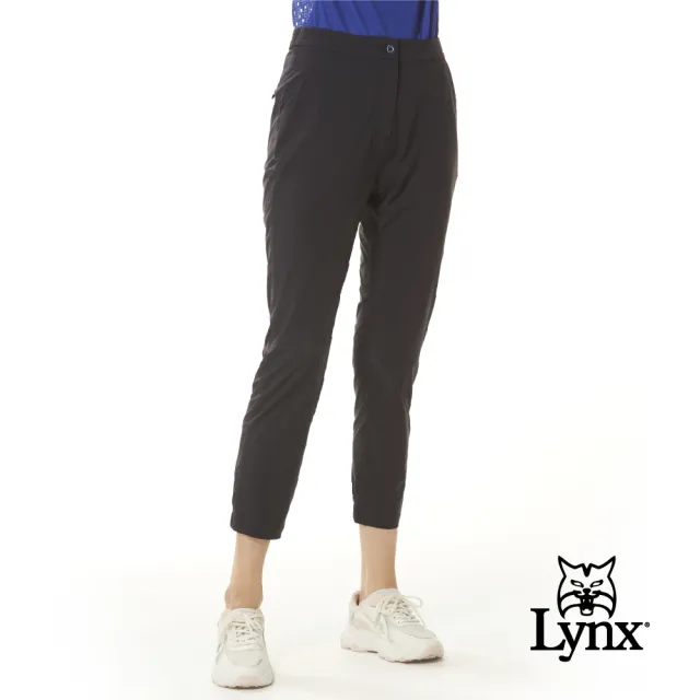 【Lynx Golf】女款吸溼排汗隱形拉鍊後口袋質感鬆緊帶造型縮口設計錐形八分褲(丈青色)