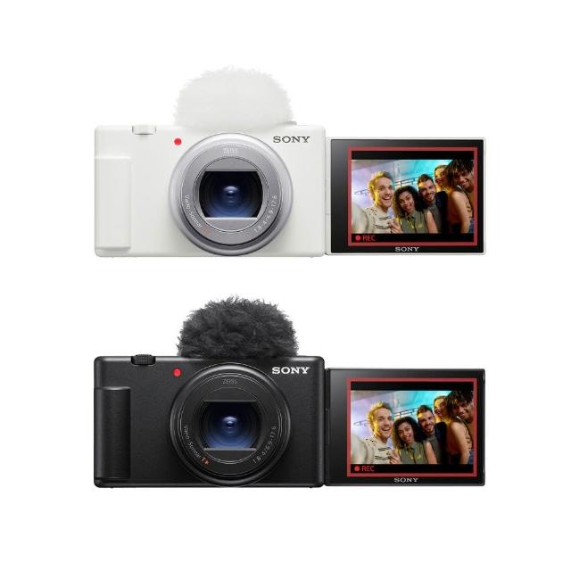 SONY 索尼 ZV-1 II 是一款專為 Vlog 創作設計的類單眼相機，搭載 1 吋 Exmor RS CMOS 影像感應器，有效畫素約 2010 萬，提供高品質影像捕捉。配備 3.0 吋以上翻轉式可觸控螢幕，方便自拍與角度調整；2.7 倍光學變焦鏡頭，支援 PASM 手動模式。無觀景窗設計，輕巧尺寸約 105.5 x 60.0 x 46.7 mm，使用 SD/SDHC/SDXC 儲存媒介與鋰電池供電。顏色選擇黑色/白色，公司貨 24 個月保固，完美適合內容創作者與攝影愛好者。