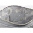 【CHANEL 香奈兒】Logo 銀色鏤空標誌牛皮一字型拉鍊零錢包(淺灰色)
