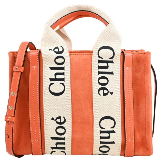 【Chloe’ 蔻依】Woody 經典品牌LOGO織帶個性麂皮手提兩用包(橘 小)