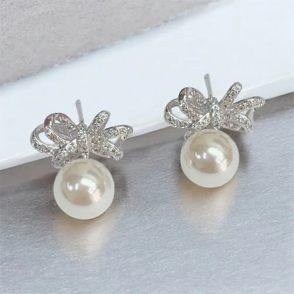 【Angely】俏麗蝴蝶結貝珠耳環