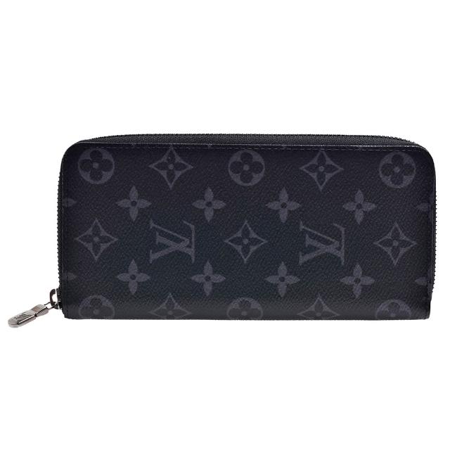 LV LOUIS VUITTON 路易威登 M62295 經典 Monogram Eclipse 帆布全開拉鍊手拿長夾，灰色系設計，外層為高質感帆布，內層為牛皮材質，內設17個夾層與1個內袋，適合日常使用，簡約時尚，男款設計，來自西班牙製造，歐洲來源，是收藏與實用兼具的經典配件。