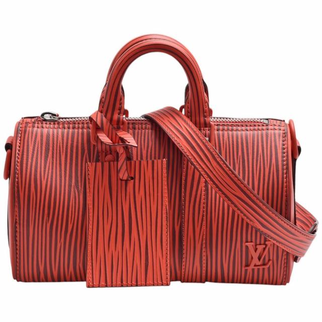 全新 LOUIS VUITTON 路易威登 M11588 經典 Keepall Bandouli è re 25 Epi 牛皮手提斜揹包，紅色系設計，適合女性使用。外層與內層均為高質感牛皮材質，搭配原廠防塵套與可調背帶，輕便實用。尺寸為25x11x15cm，提把高度8cm，背帶全長93cm，法國製造，來自歐洲，拉鍊式開口，內有1個口袋，不附底珠與A4尺寸空間。