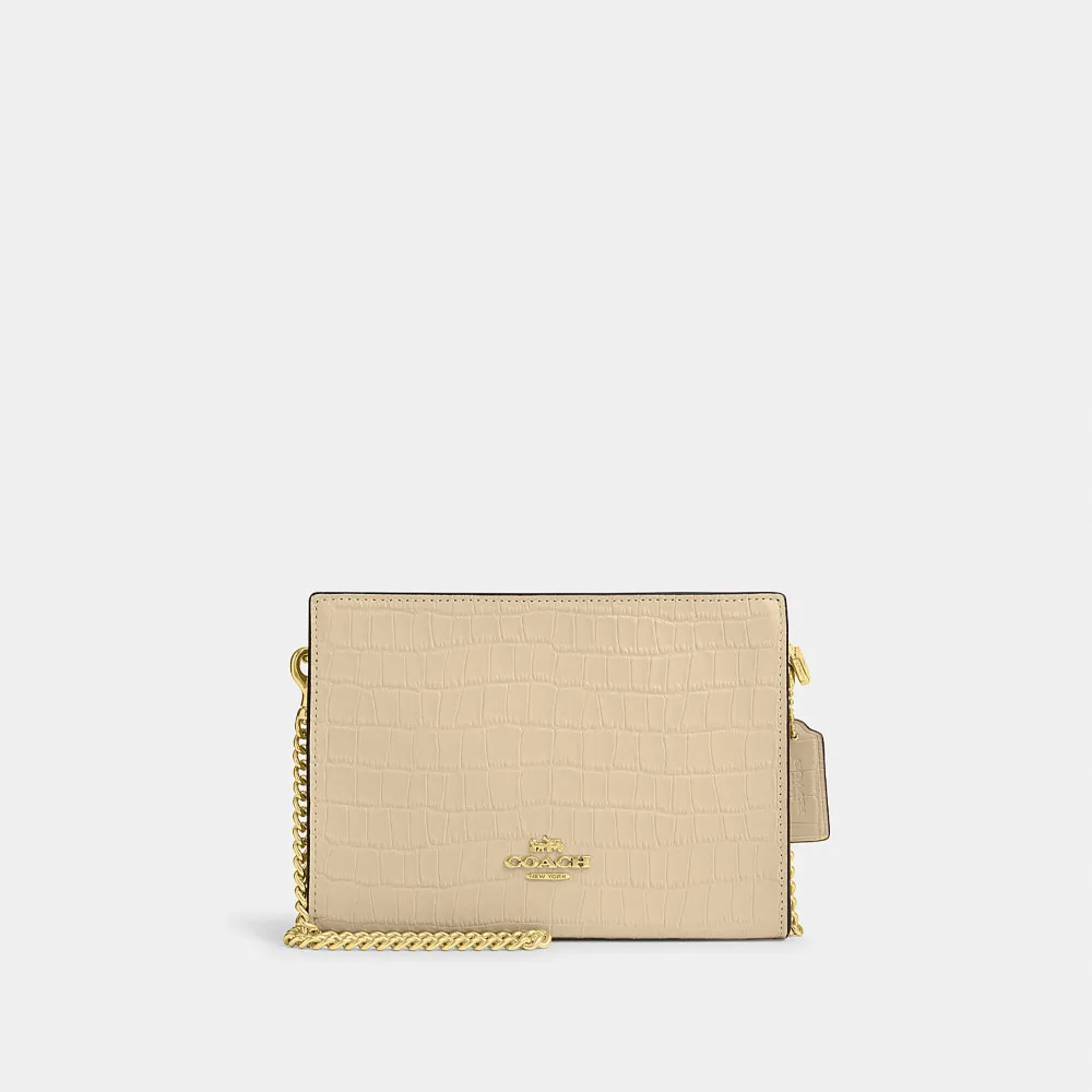 【COACH】蔻馳官方直營 SLIM纖巧型斜背包 側背包 斜挎包 手拿包-IM/象牙白色(CR237)