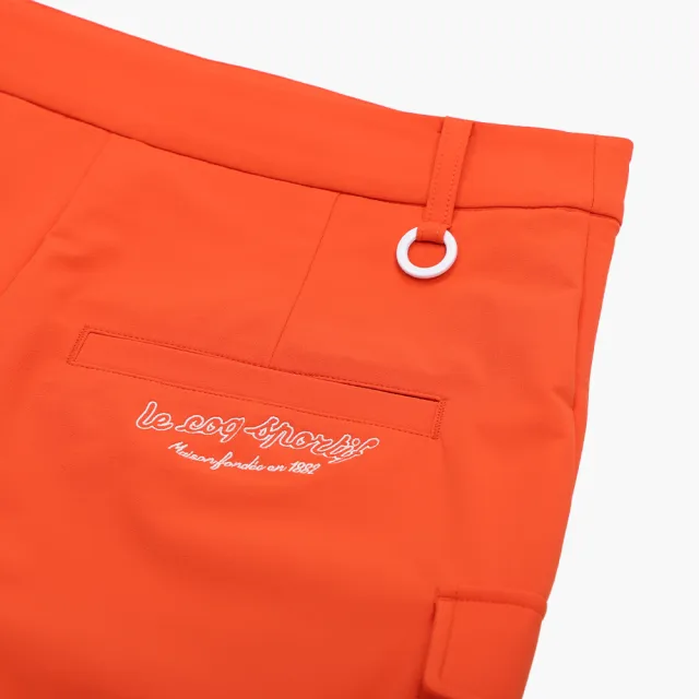 【LE COQ SPORTIF 公雞】高爾夫系列 女款橘色彈性防撥水防油防污短褲 QLX8T901