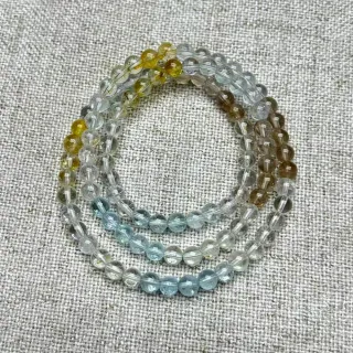 【佰財水晶珠寶】5.6mm天然透體彩托帕石三圈手串