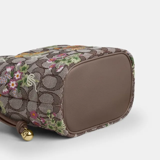 【COACH】蔻馳官方直營 FAYE 迷你花卉刺繡單肩手袋 肩背包 拉繩包(CDZ94)