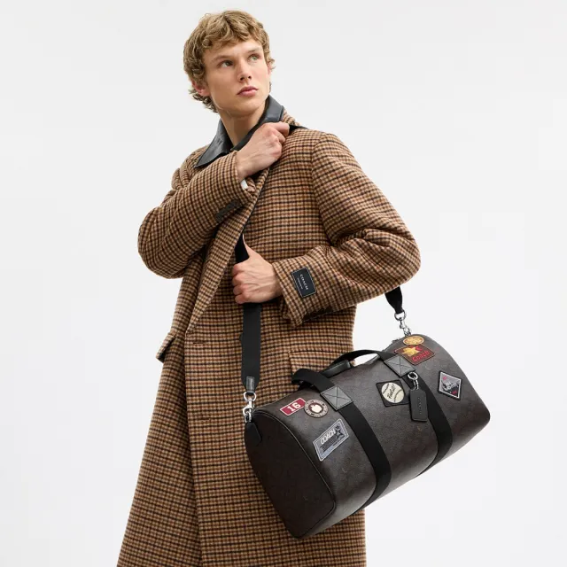 【COACH】蔻馳官方直營 EXPLORER 45 經典 SIGNATURE 貼飾行李袋 旅行袋 斜背包-SV/核桃棕色/黑色(CGA25)