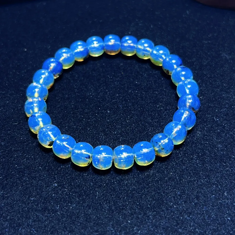 【勝弘珠寶】多明尼加天空藍風景珀老型手串-8*7MM